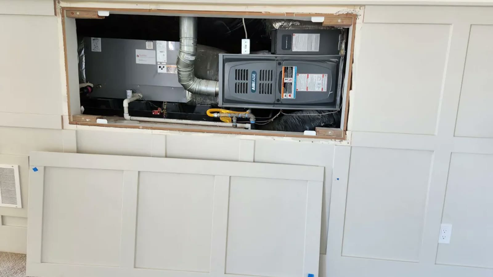 HVAC technician diagnosing a Sun City cooling system